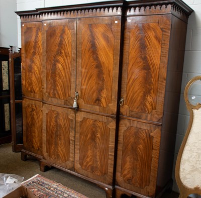 Lot 1461 - An Edwardian Mahogany Breakfront Four-Door...