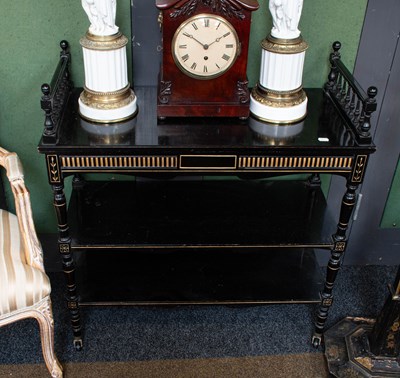 Lot 1469 - An Aesthetic Period Ebonised Three-Tier...