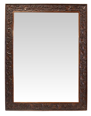 Lot 702 - An Arts & Crafts Oak Easel Mirror, the frame...
