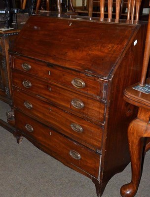 Lot 688 - Georgian mahogany bureau