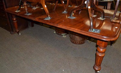 Lot 695 - A Victorian mahogany wind-out dining table