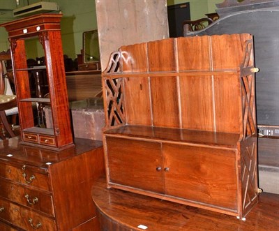 Lot 702 - A mahogany wall cupboard and a set of reproduction wall shelves