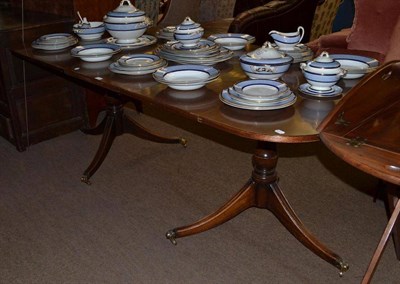 Lot 715 - A reproduction mahogany twin pedestal dining table