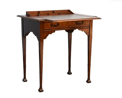 Lot 717 - An Arts & Crafts Oak Stones Patent Mechanism...