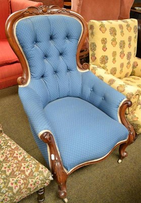 Lot 725 - A Victorian walnut framed button back open easy chair