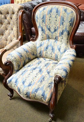 Lot 729 - A Victorian mahogany framed upholstered easy chair