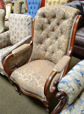 Lot 730 - A Victorian mahogany framed button back upholstered open armchair