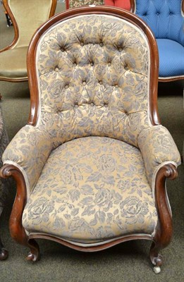 Lot 732 - A Victorian mahogany framed button back upholstered easy chair