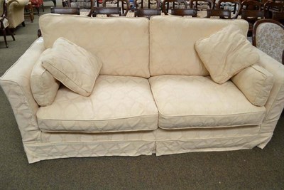 Lot 737 - Yellow upholstered sofa