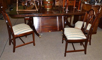 Lot 754 - Reproduction mahogany dining table with two leaves and six chairs and matching sideboard