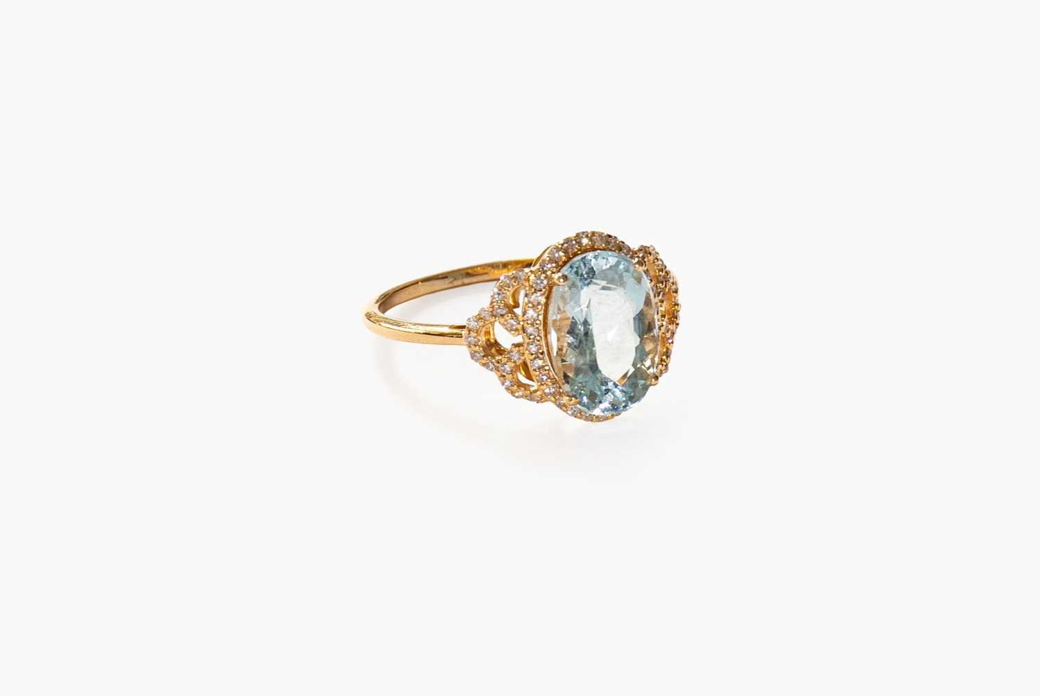 Lot 18 - An Aquamarine and Diamond Cluster Ring, the...