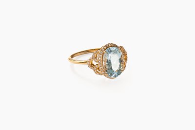 Lot 18 - An Aquamarine and Diamond Cluster Ring, the...
