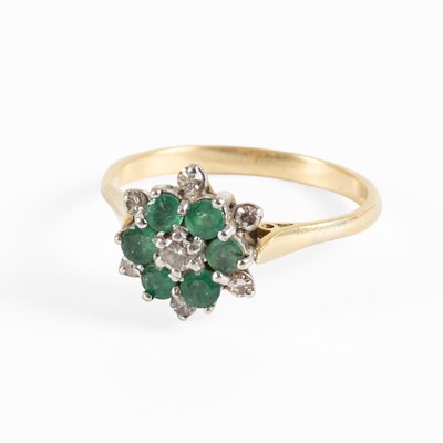 Lot 100 - An Emerald and Diamond Ring, the round...