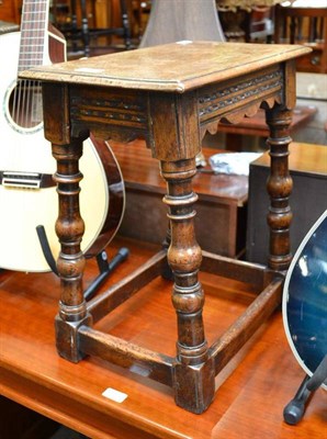 Lot 763 - A 17th century style joint stool with rectangular moulded top, carved frieze and turned legs joined