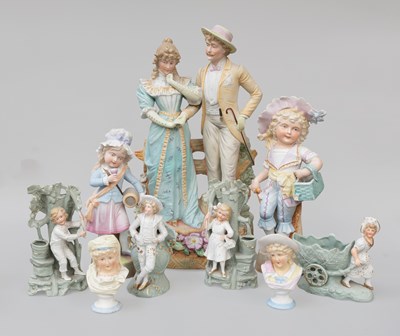 Lot 533 - A Collection of Coloured Bisque Figure Groups,...
