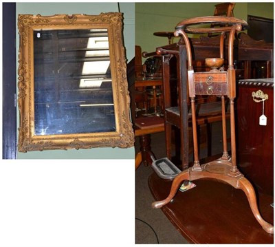 Lot 768 - A 18th century mahogany washstand and a 19th century gilt framed mirror (2)