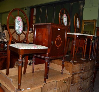 Lot 775 - An inlaid bedside cabinet and three matching bedroom chairs