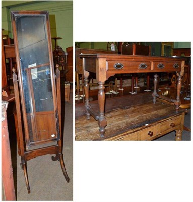 Lot 782 - An oak framed cheval mirror and an oak side table with two drawers