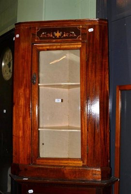 Lot 786 - A 19th century glazed mahogany hanging corner cupboard