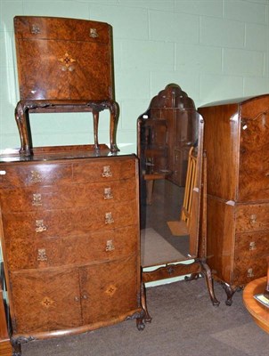 Lot 792 - Three piece walnut inlaid bedroom suite by Merryweather of Holloway London and a walnut cheval...