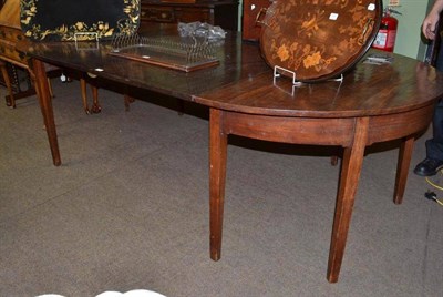 Lot 796 - A mahogany D-end dining table with two later leaves