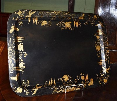 Lot 799 - A 19th century gilt decorated toleware tray of broad rectangular form