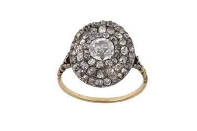 Lot 2356 - A Diamond Cluster Ring the old cut diamond...