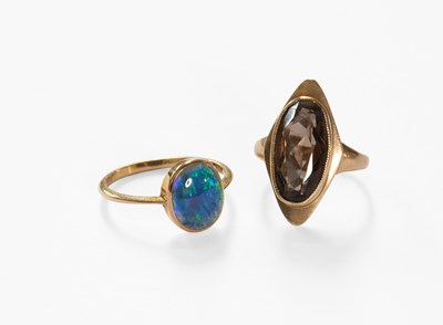 Lot 16 - A 9 Carat Gold Smoky Quartz Ring, the oval cut...