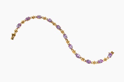 Lot 54 - A Cubic Zirconia Bracelet, eleven oval cut...
