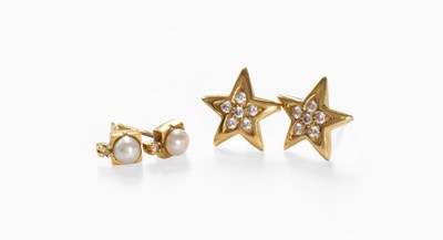 Lot 40 - A Pair of Cubic Zirconia Earrings, of star...