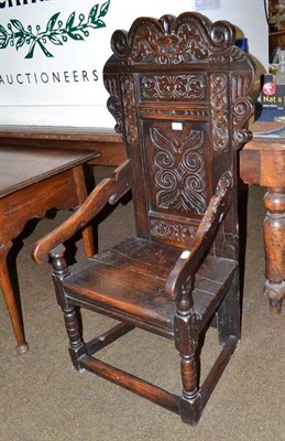 Lot 813 - An oak Wainscott style chair