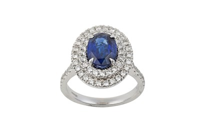 Lot 2199 - An 18 Carat White Gold Sapphire and Diamond...