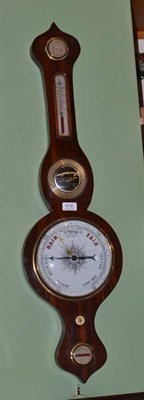 Lot 818 - A wheel barometer