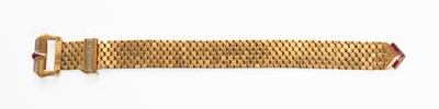 Lot 33 - A Ruby and Diamond Buckle Bracelet, the broad...