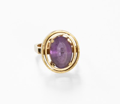 Lot 56 - An Amethyst Ring, the oval cut amethyst in a...