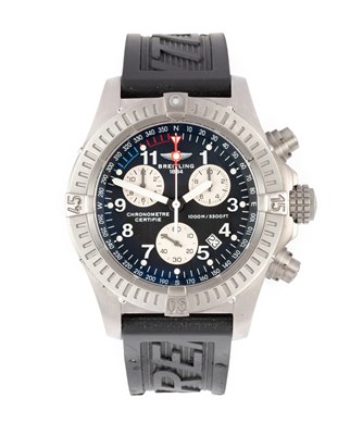Lot 2393 - Breitling: A Titanium Calendar Chronograph...