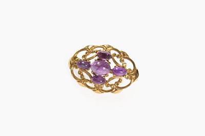 Lot 20 - A 9 Carat Gold Amethyst Brooch, an oval...