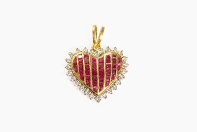 Lot 34 - A Ruby and Diamond Heart Pendant, the centre...