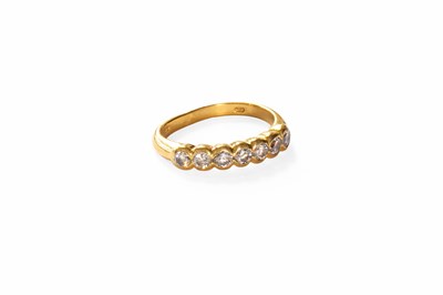 Lot 75 - An 18 Carat Gold Diamond Half Hoop Ring, seven...