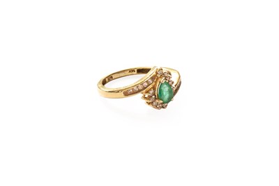 Lot 35 - An Emerald and Diamond Cluster Ring, the pear...