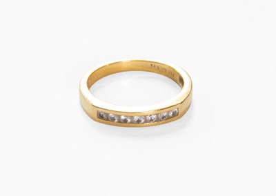 Lot 25 - An 18 Carat Gold Diamond Half Hoop Ring, seven...