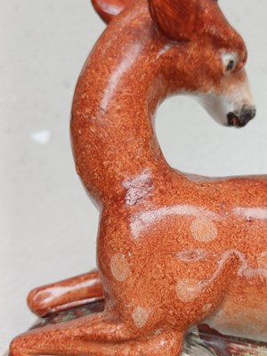 Lot 1073 - A Staffordshire Pearlware Model of a Stag and...