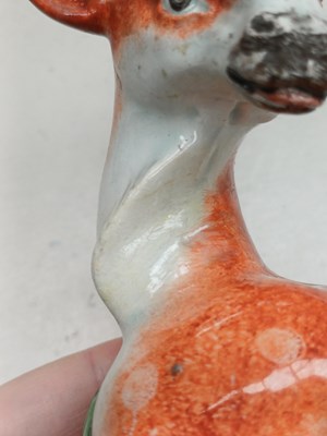 Lot 1073 - A Staffordshire Pearlware Model of a Stag and...