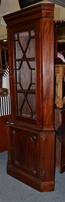 Lot 846 - A reproduction mahogany standing corner cupboard