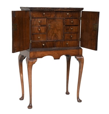 Lot 471 - An 18th-Century Walnut Feather-Banded Chest on...