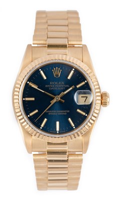 Lot 2372 - Rolex: An 18 Carat Gold Mid-Size Automatic...