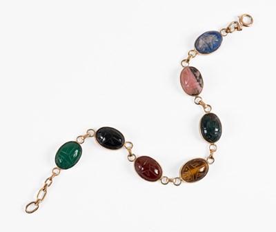 Lot 86 - A Hardstone Scarab Bracelet, seven chain...