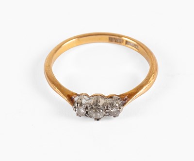 Lot 74 - A Diamond Three Stone Ring, the central old...