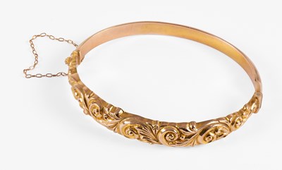 Lot 97 - A 9 Carat Gold Bangle, the upper section with...