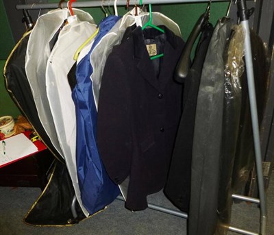 Lot 885 - Assorted gents suits, two black and a navy hunting coat, leather jacket, suits etc